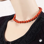 Kæde 10 mm rund perle orange-sort-marmoreret plastik