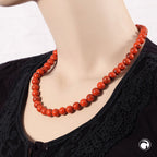 Kæde 10 mm rund perle orange-sort-marmoreret plastik