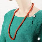 Kæde 10 mm rund perle orange-sort-marmoreret plastik