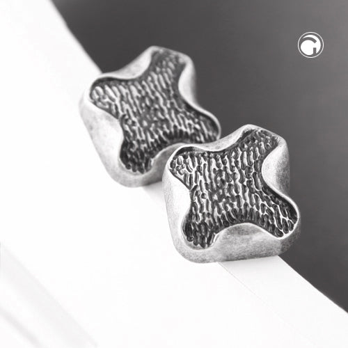 Clip-ørering ca. 27x29mm kors abstrakt gammel sølvplastik