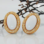 Clip ørering 30x21mm oval hvid med ramme i guldfarvet plastik bouton