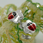 Ørestikker 6mm børneøreringe Ladybug på blomst sølv 925